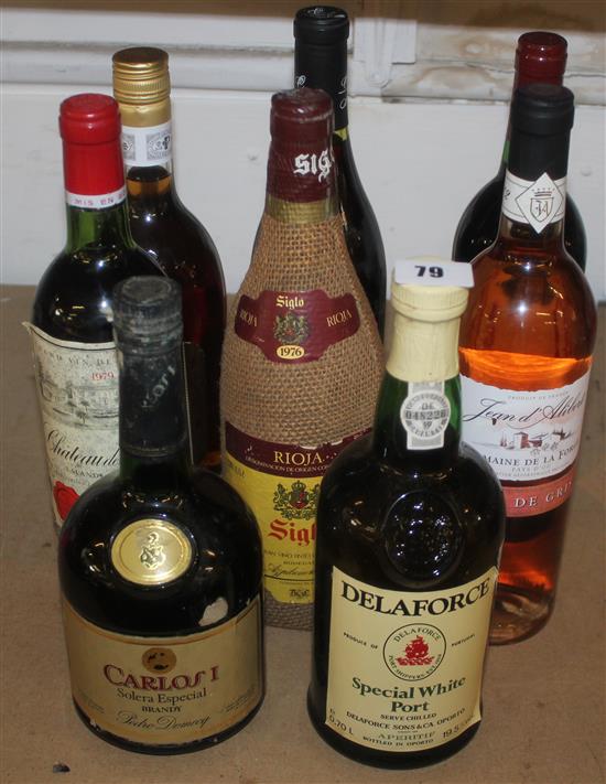 8 various brandy, red wines and rose